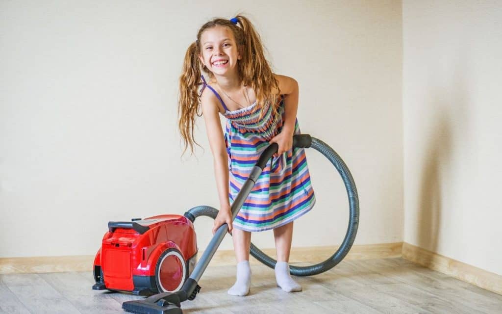 girl vacuuming