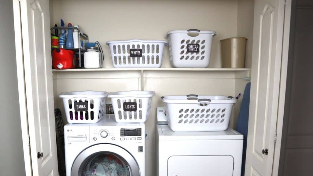 Laundry sorting baskets in small laundry closet