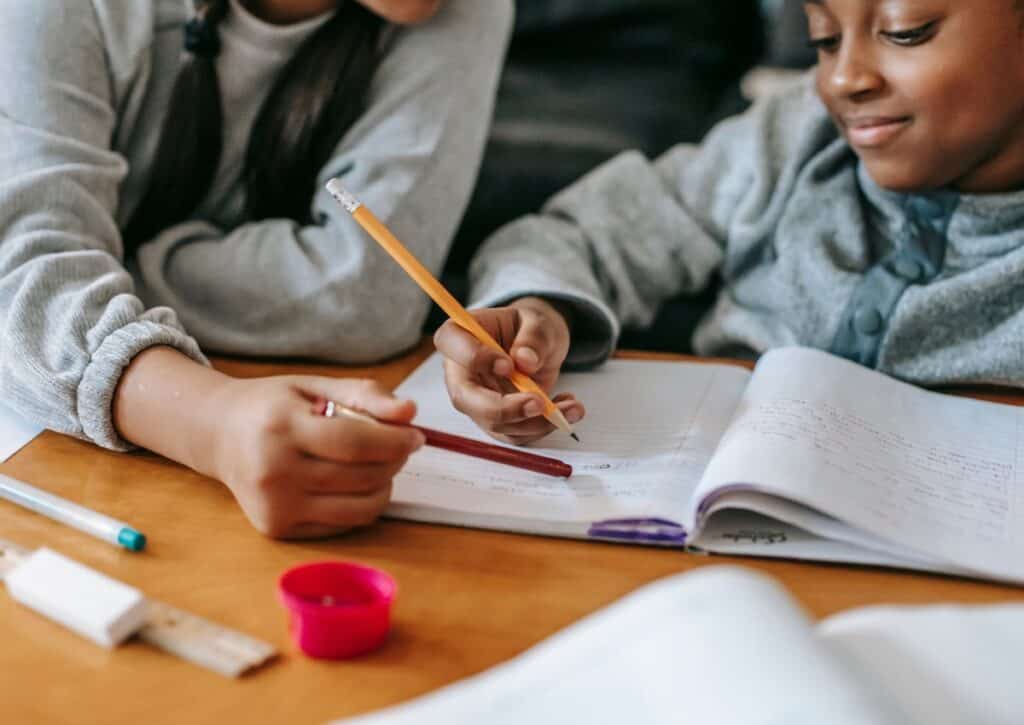 mom doing homework with kid