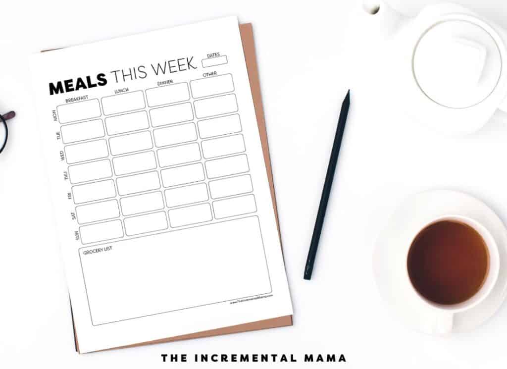 meal planner template on white desk