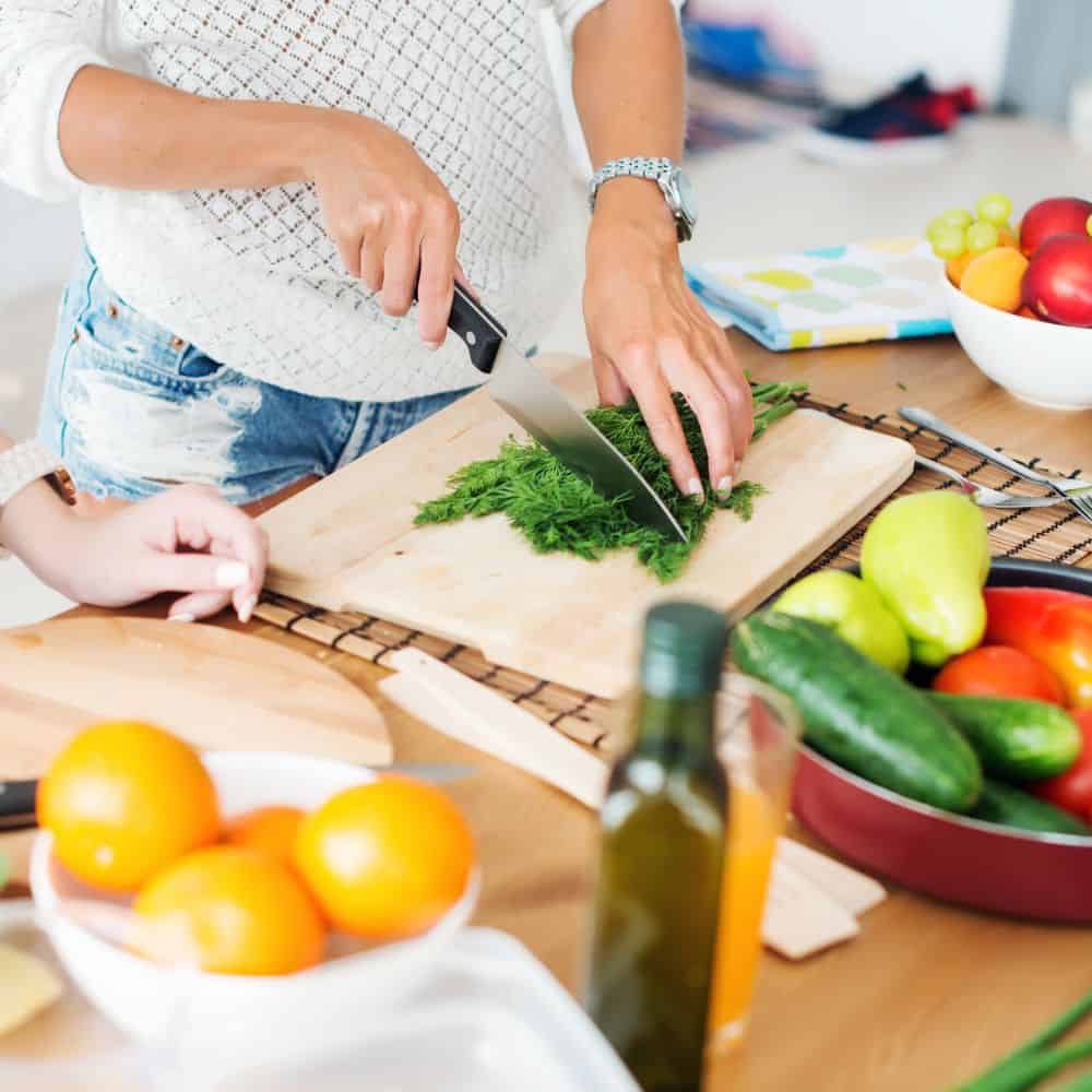 woman meal prepping healthy food