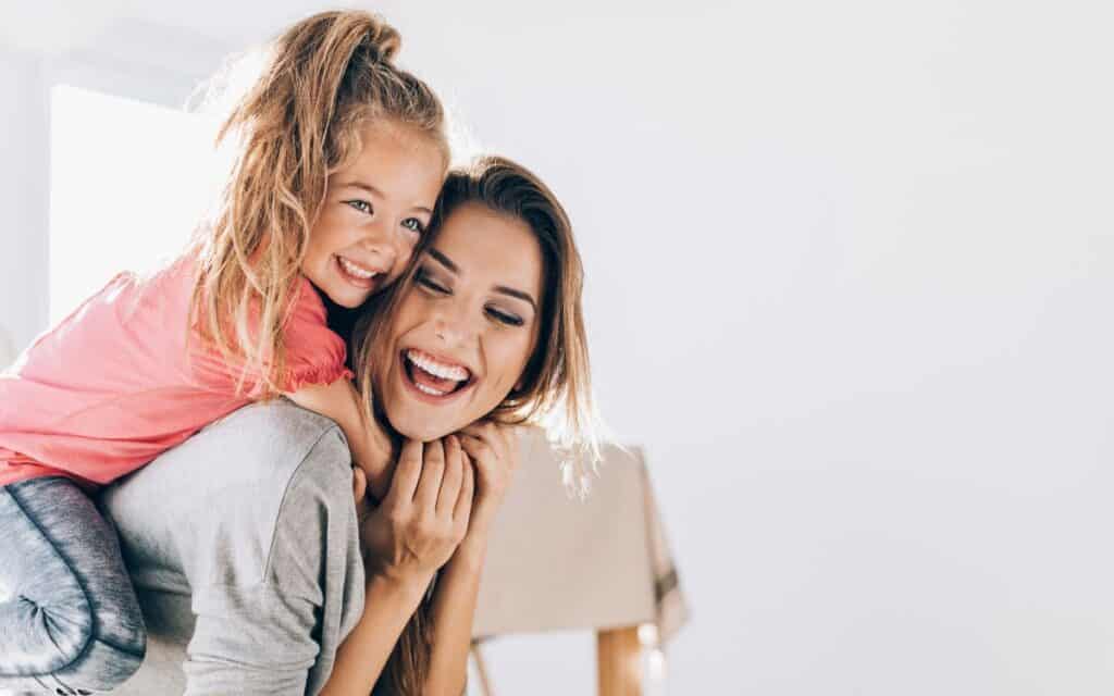 happy mom and daughter