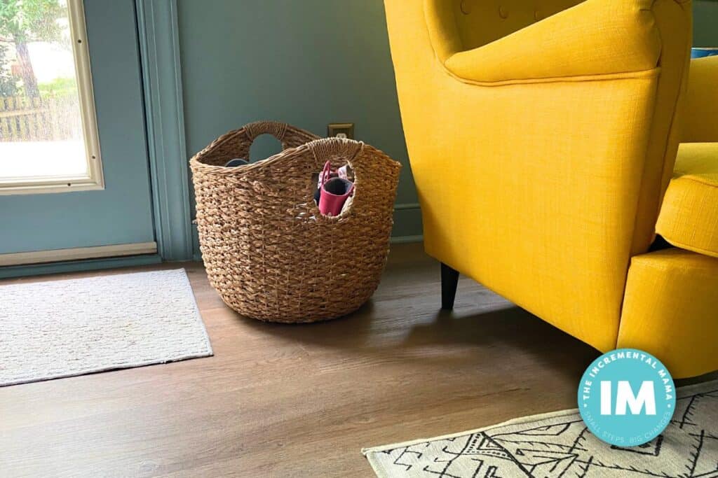 cute woven shoe basket by door