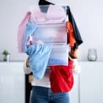 woman struggling to declutter